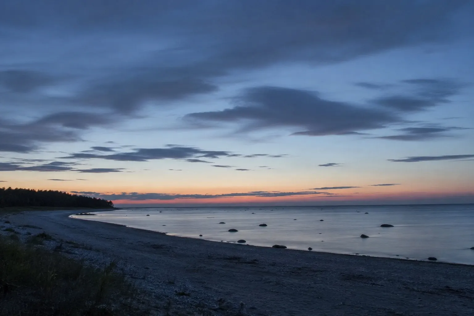 Midsummer twilight over an Estonian beach, the sky too light for stars — a metaphor for mandatory EPDs bringing more light but no points to navigate by